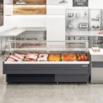 Coldline SDC98 102" Refrigerated Curved Glass Meat Deli Case with Rear Storage