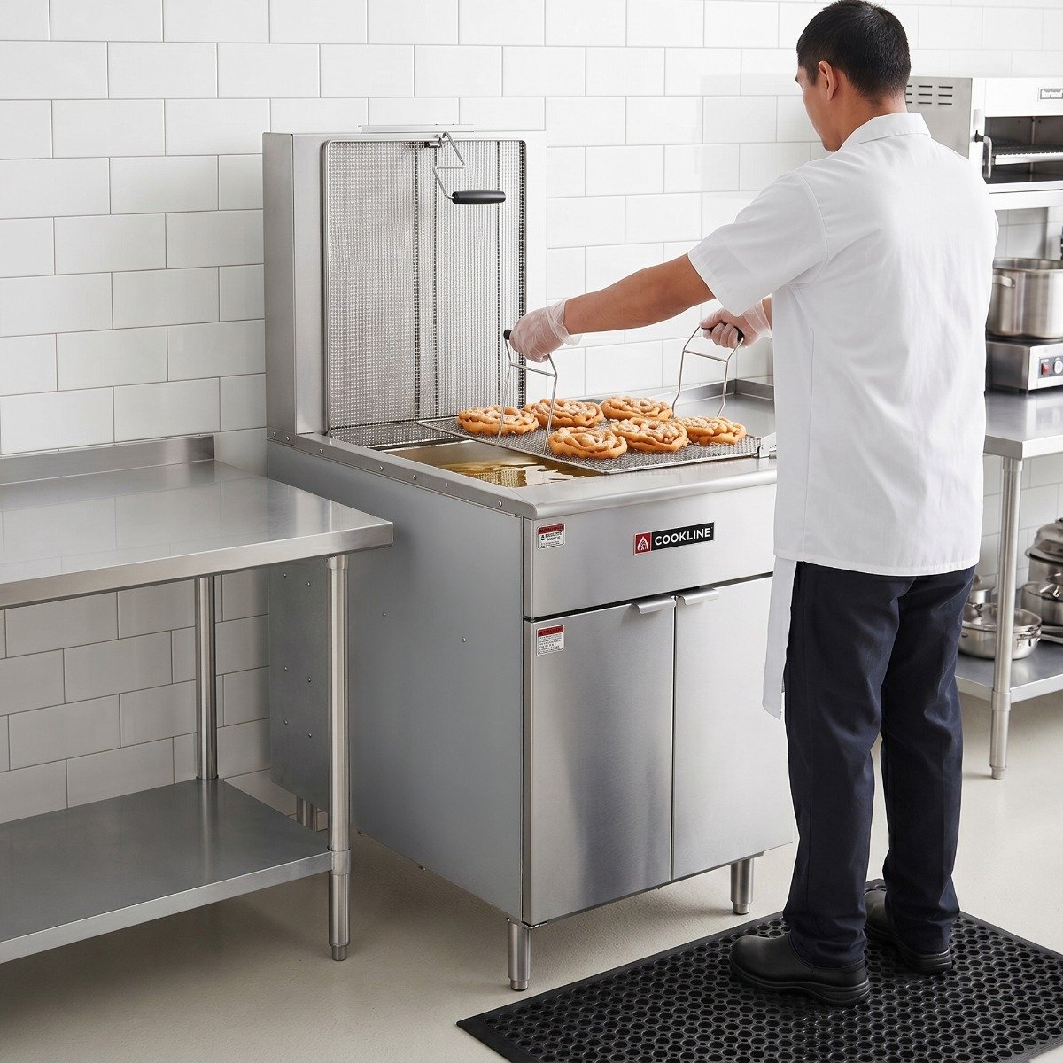 dof-125-commercial-125-lb-gas-flat-bottom-donut-fryer-90_000-btu-angle-lifestyle_1.jpg Cookline DOF-170 Commercial 170 lb. Gas Flat Bottom Donut Fryer - 120,000 BTU - Image 1