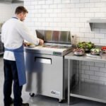 Coldline SPN-29 29" Narrow Depth Refrigerated Sandwich Prep Table with Cutting Board and 8 Food Pans